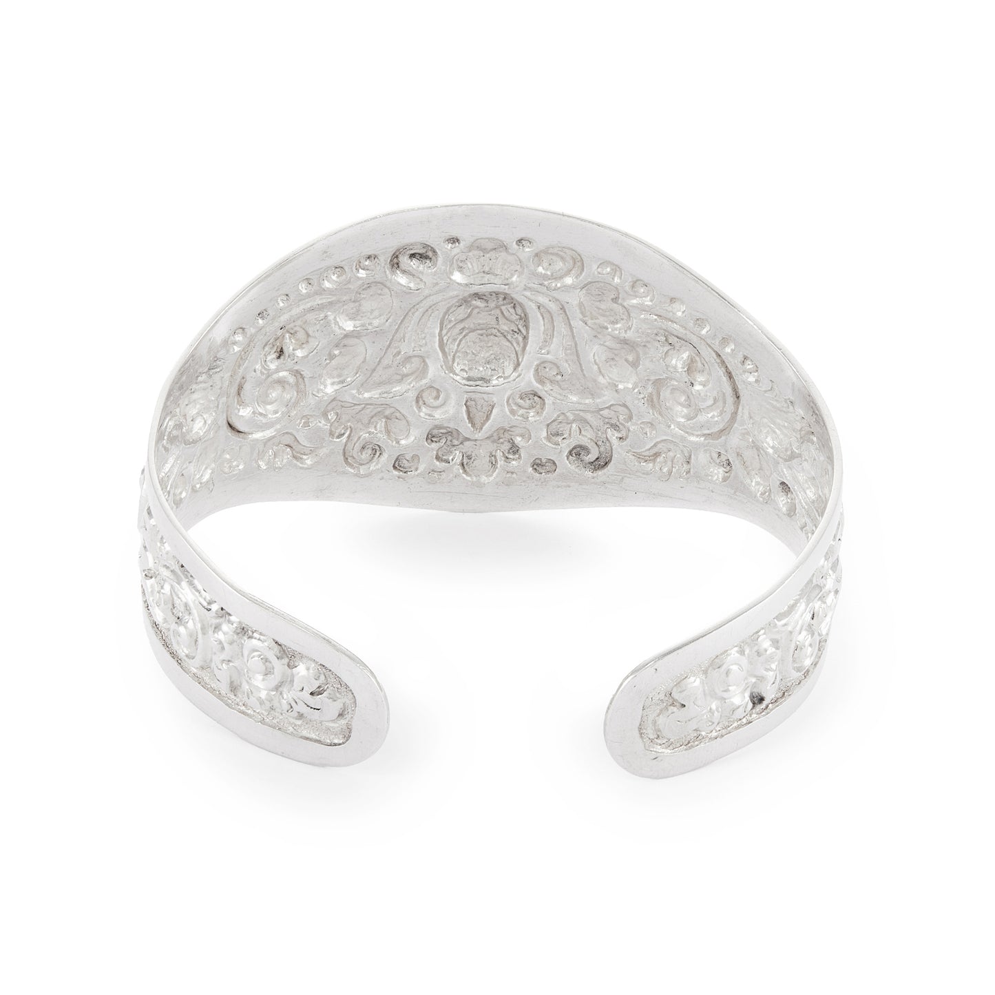 Gorgeous silver repoussé bangle with ornate detail. The bangle is open so the size is adjustable. Circa 1930s