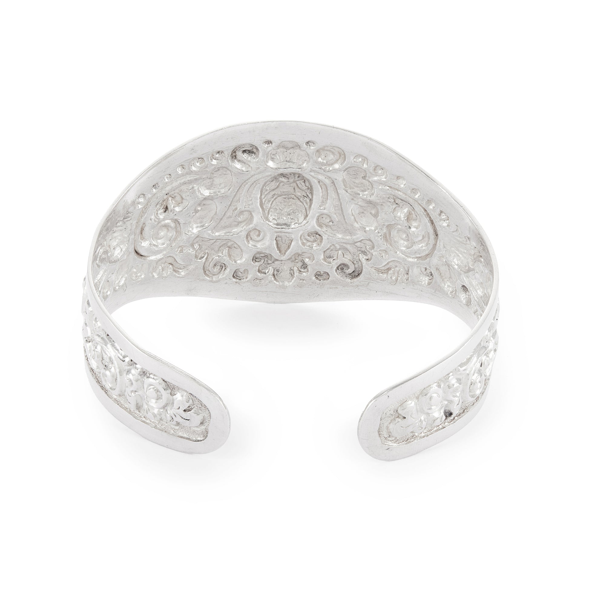 Gorgeous silver repoussé bangle with ornate detail. The bangle is open so the size is adjustable. Circa 1930s