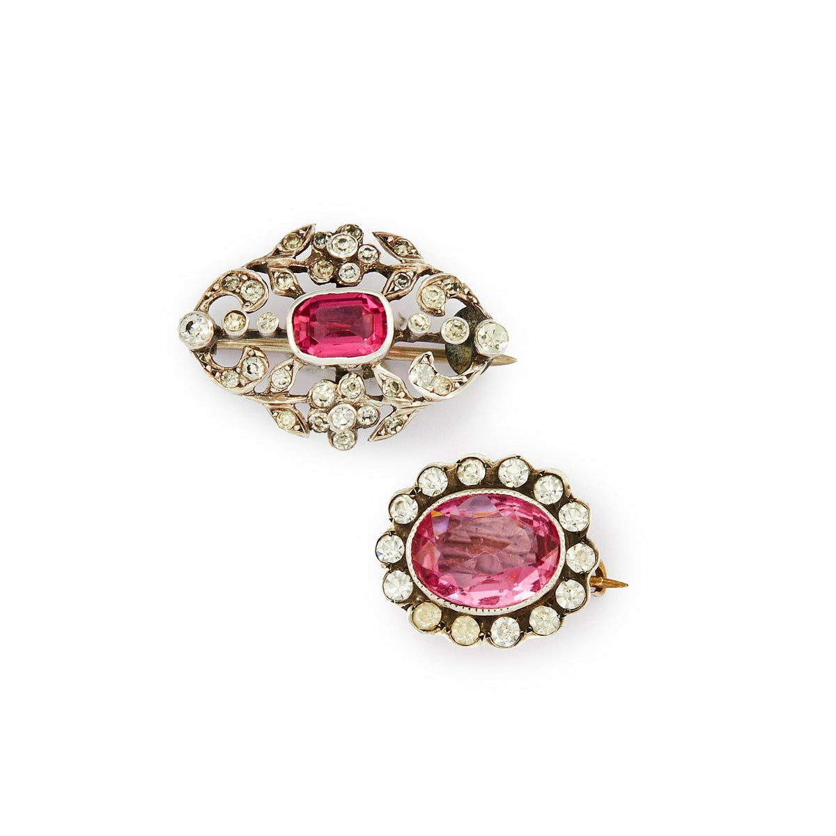 Pair of quaint Victorian silver miniature brooches set with pink and white paste stones. Lovely to be worn together or individually.