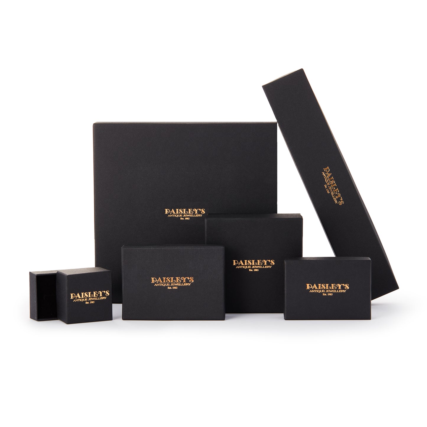 Set of black jewellery boxes with gold logo on a white background