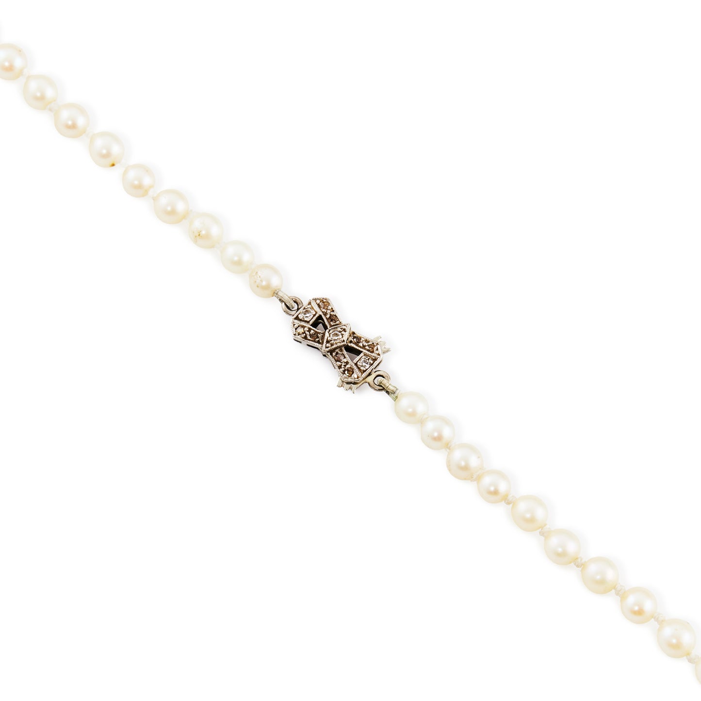 Lustrous string of graduated cultured saltwater pearls with an 18ct white gold Art Deco clasp set with old and mine cut diamonds.
