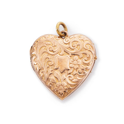 Pretty rose gold plated double-sided Victorian locket with embossing on the front. The locket opens and can hold photographs.