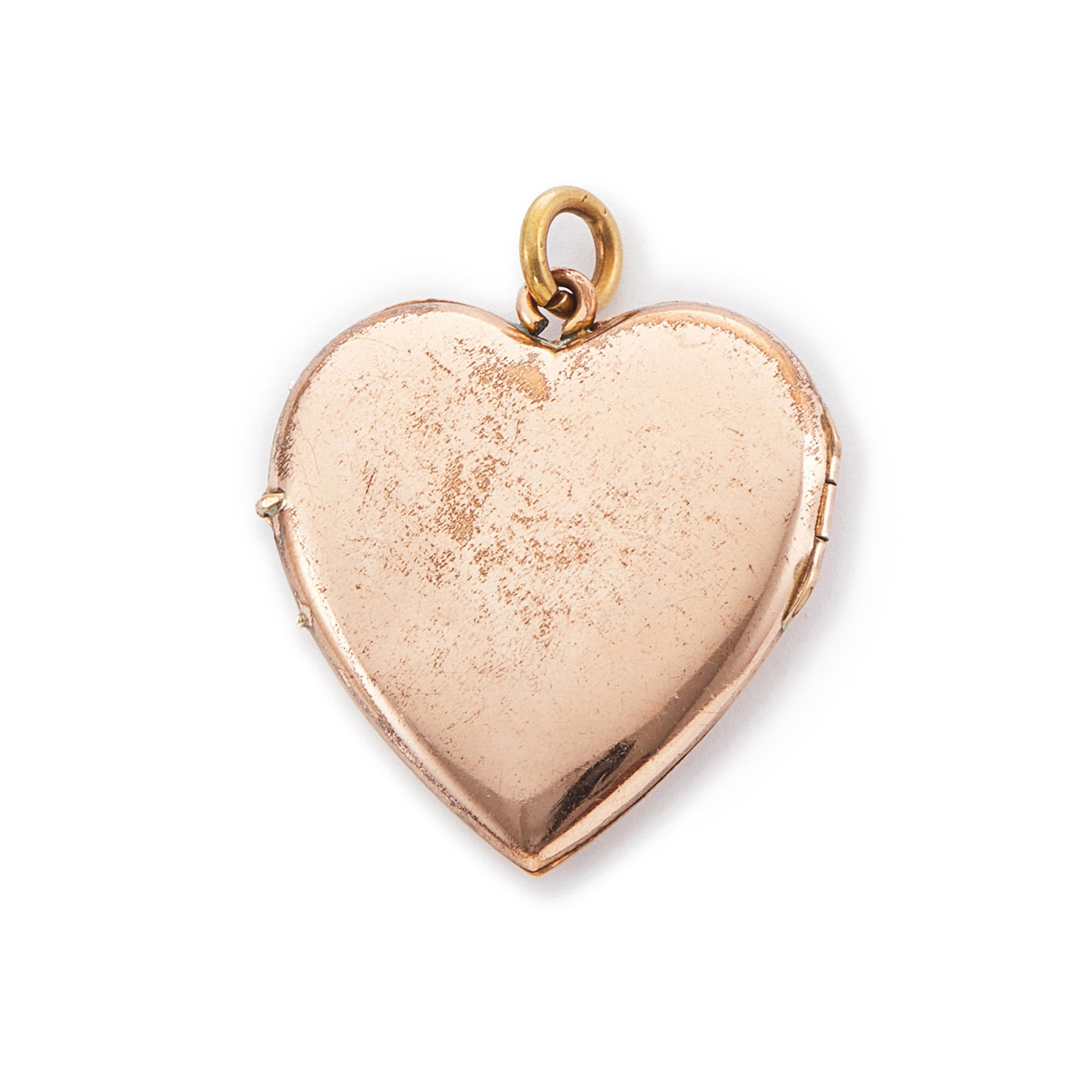 Pretty rose gold plated double-sided Victorian locket with embossing on the front. The locket opens and can hold photographs.