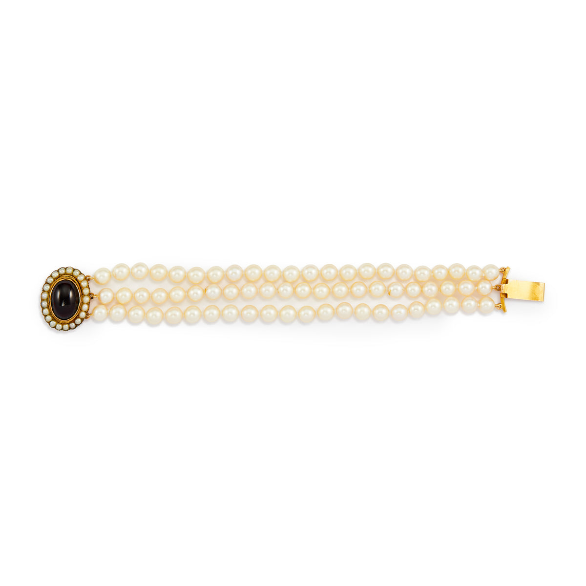 Glamorous three strand cultured seawater pearl bracelet with a spectacular Victorian 9ct gold cabochon garnet and seed pearl clasp.