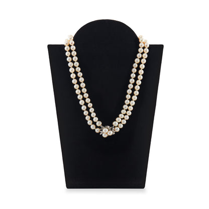 Exquisite double strand of lustrous cultured seawater pearls with a stunning 14ct white gold clasp set with nine small diamonds and three pearls. Can be worn as a choker or wrapped around the wrist as a four-strand bracelet.