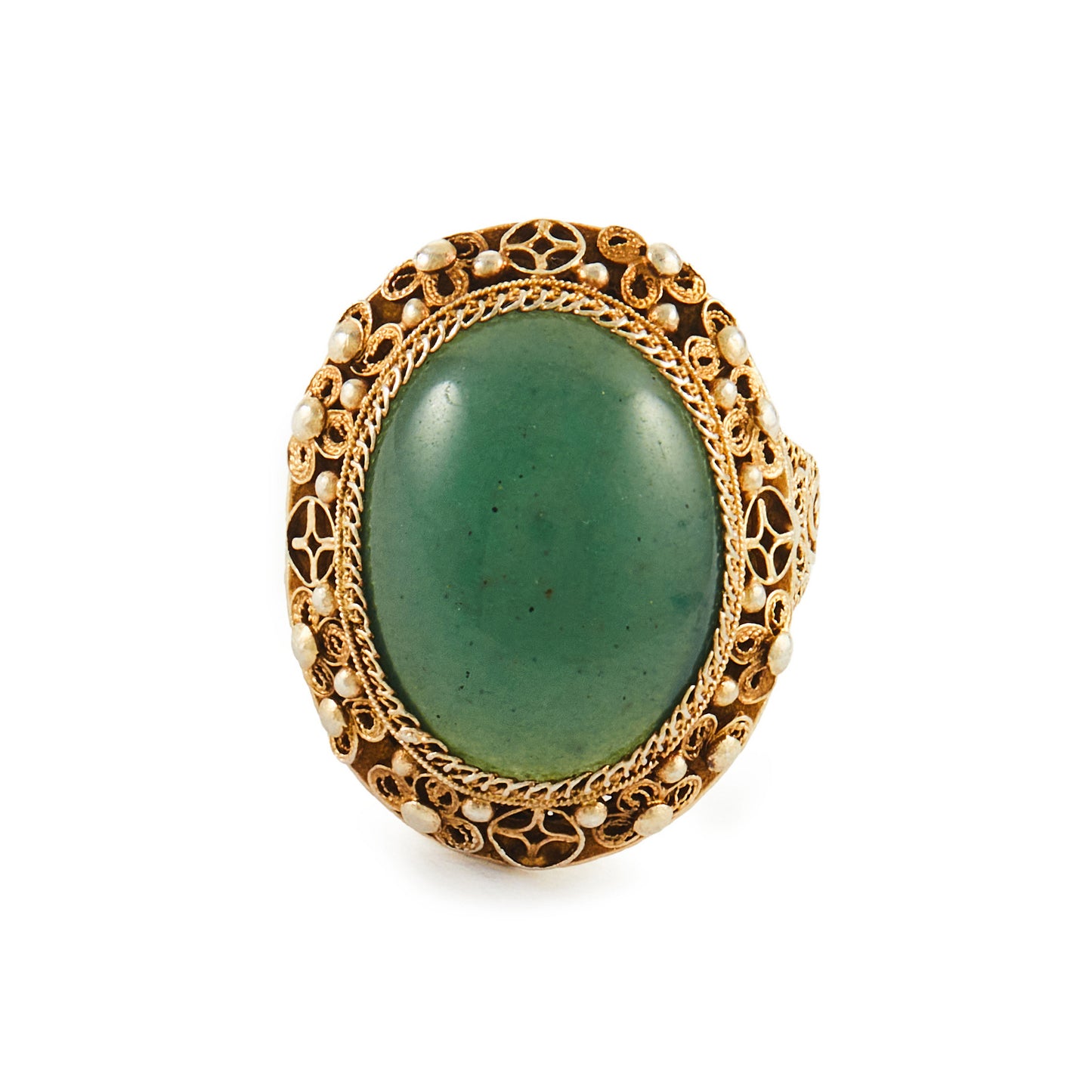 Beautiful green quartzite cabochon gemstone in an intricate filigree silver-gilt setting. Adjustable shank.