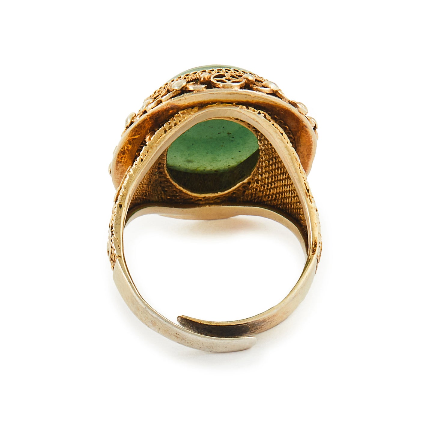 Beautiful green quartzite cabochon gemstone in an intricate filigree silver-gilt setting. Adjustable shank.