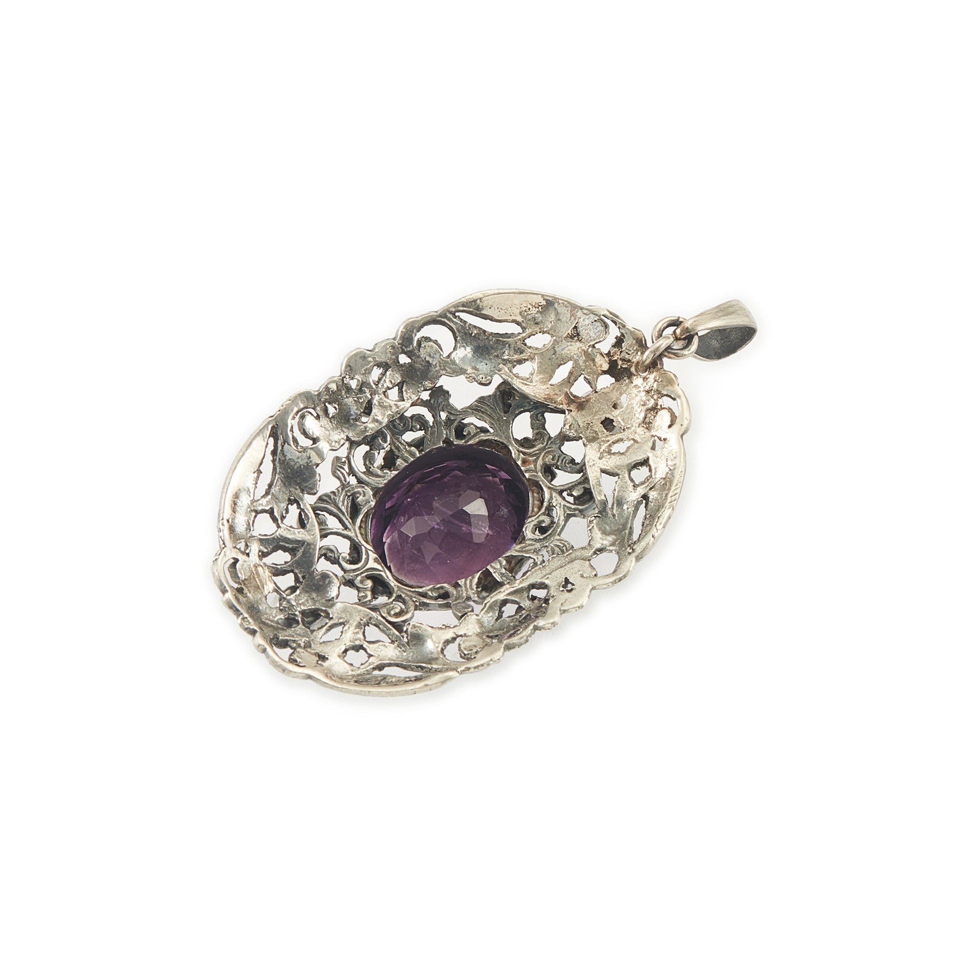 Regal silver pendant set with a large, beautifully faceted purple amethyst stone, surrounded by  eight small amethysts in an intricate design.