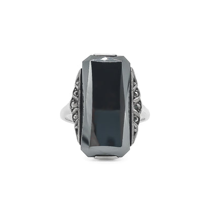 Lovely Art Deco sterling silver ring set with a faceted rectangular hematite and marcasite stones.