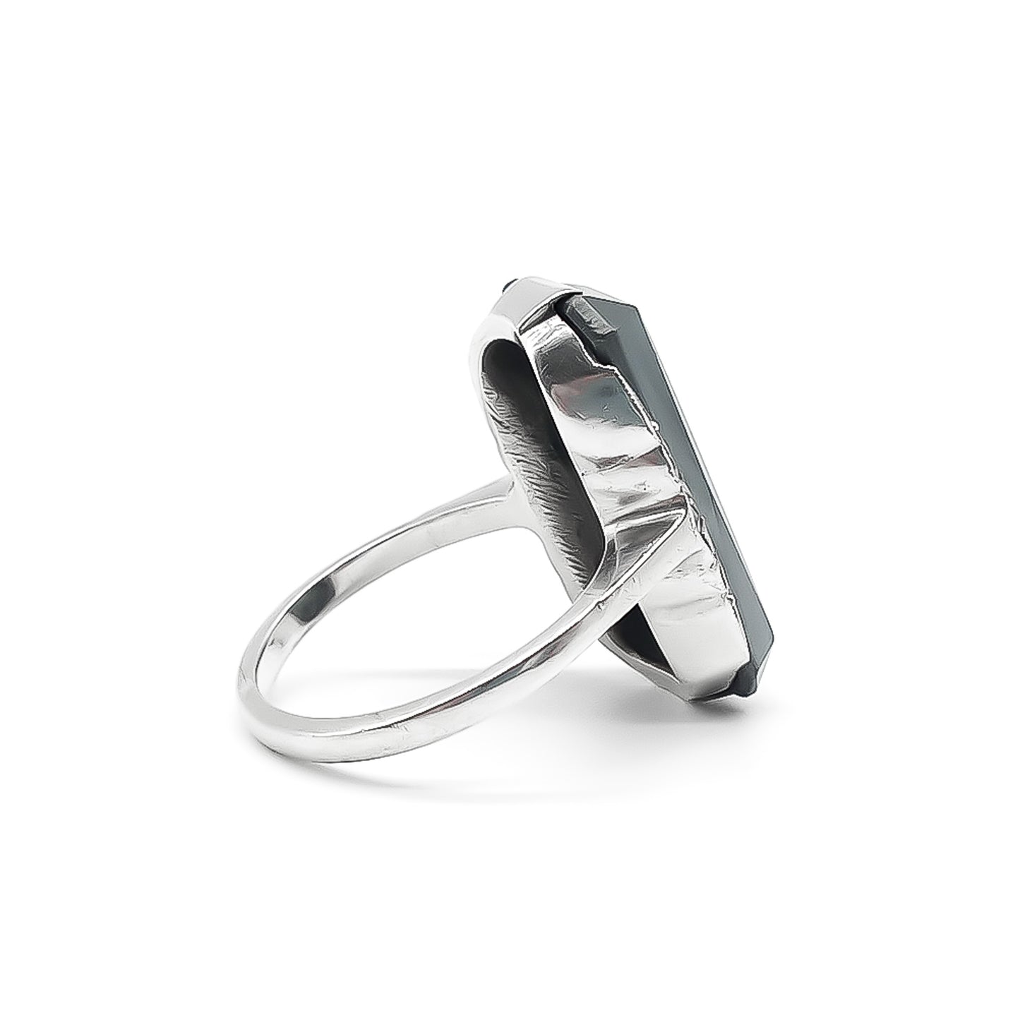 Lovely Art Deco sterling silver ring set with a faceted rectangular hematite and marcasite stones.