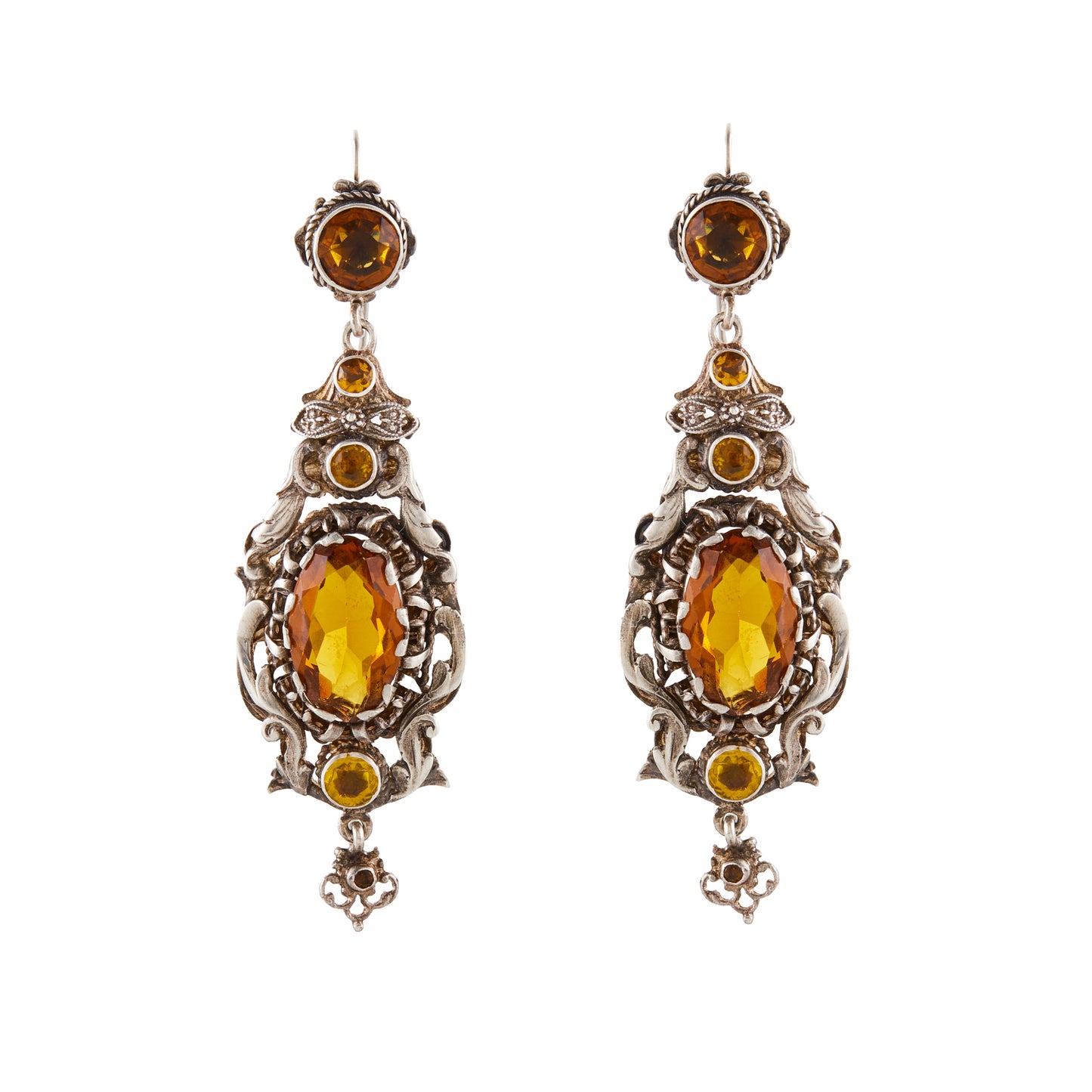 Gorgeous silver Austro-Hungarian chandelier earrings, each set with four faceted citrine coloured glass stones. Circa 1900