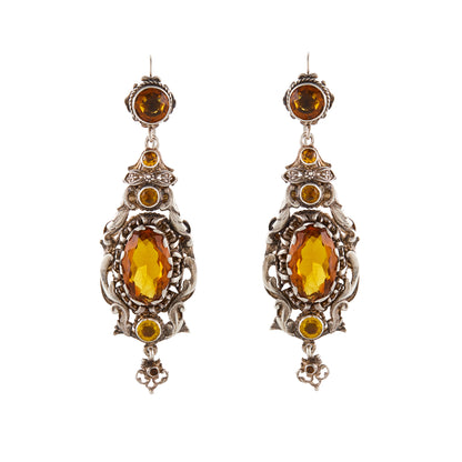 Gorgeous silver Austro-Hungarian chandelier earrings, each set with four faceted citrine coloured glass stones. Circa 1900