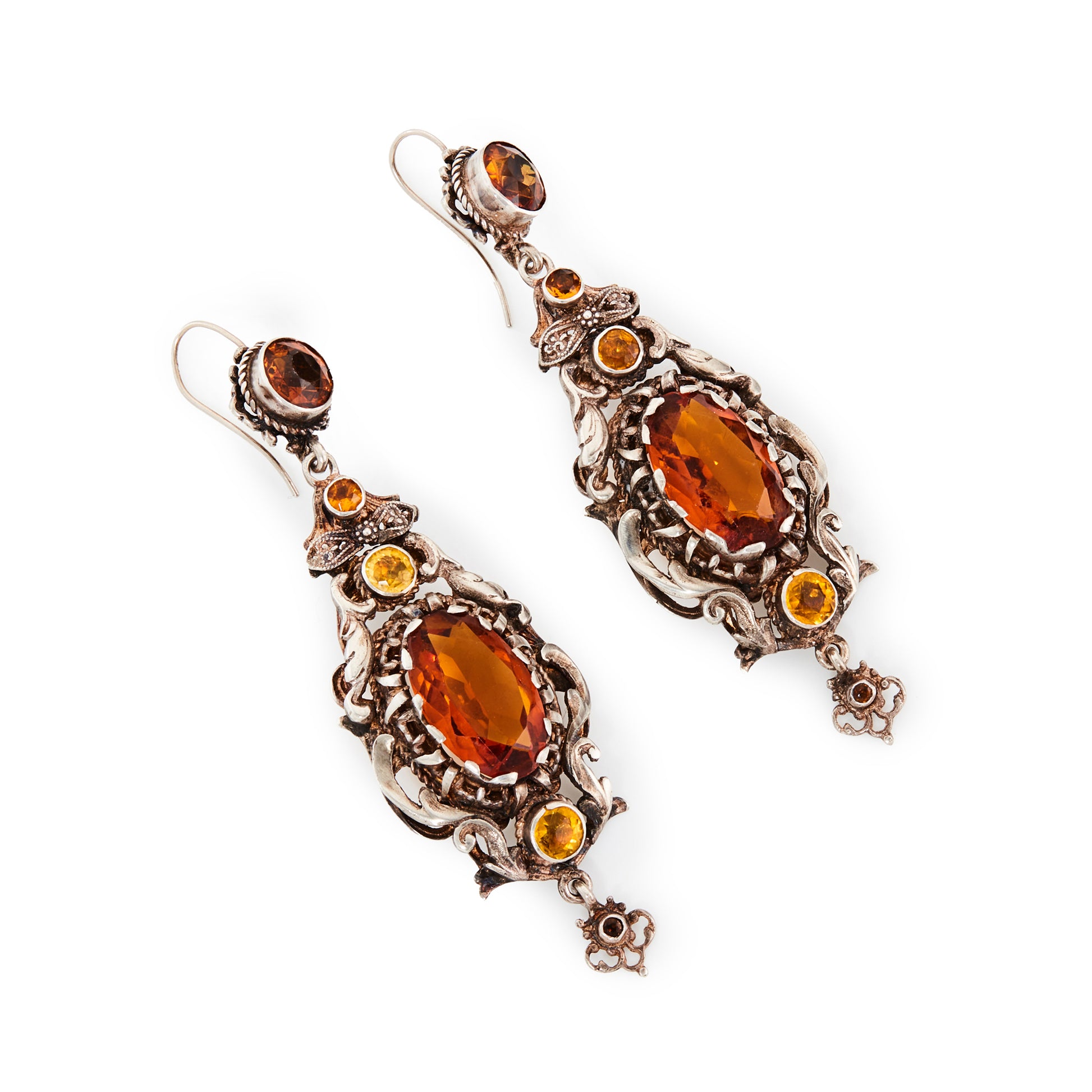 Gorgeous silver Austro-Hungarian chandelier earrings, each set with four faceted citrine coloured glass stones. Circa 1900