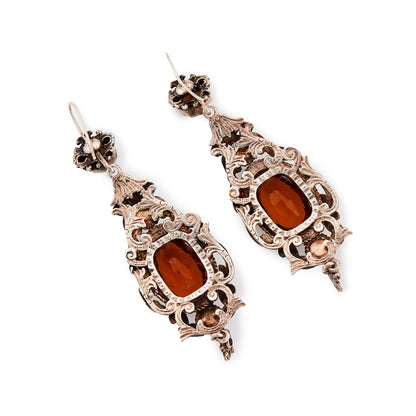 Gorgeous silver Austro-Hungarian chandelier earrings, each set with four faceted citrine coloured glass stones. Circa 1900