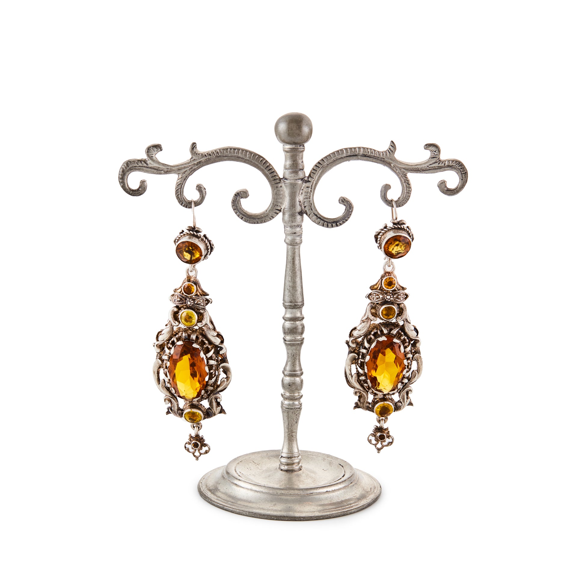 Gorgeous silver Austro-Hungarian chandelier earrings, each set with four faceted citrine coloured glass stones. Circa 1900