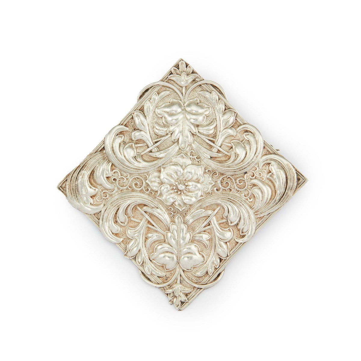Impressive Mid-Century sterling silver Candida brooch with an intricate repoussé floral design.