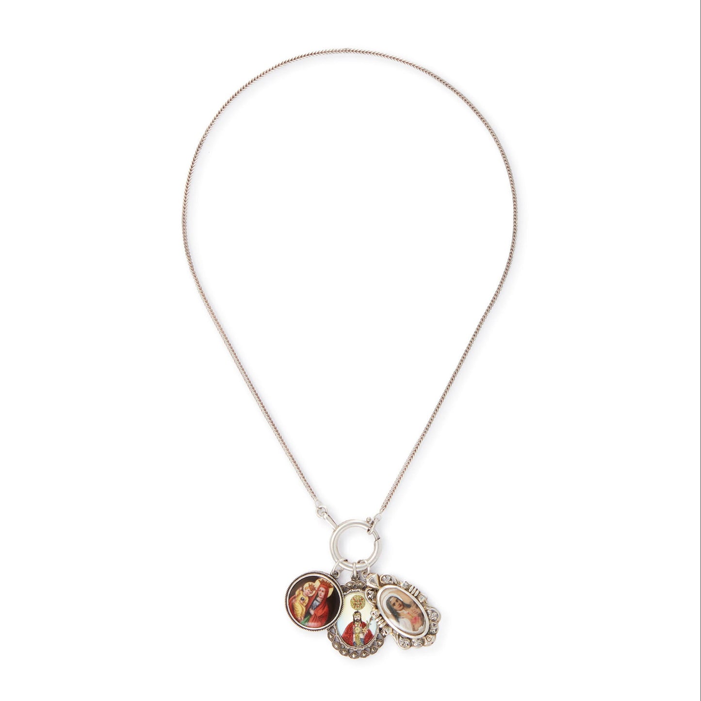 Vintage silver chain with three stunning antique religious silver pendants hanging from a large silver bolt ring clasp, one porcelain, one enamelled in a marcasite setting and one hand-painted, in an elaborate silver setting.