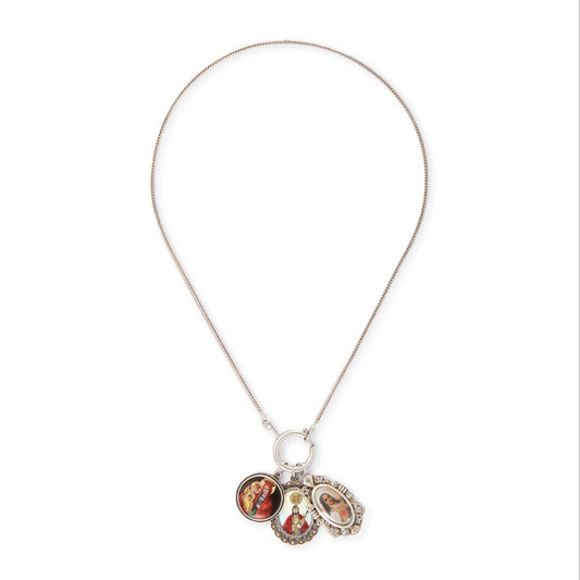 Vintage silver chain with three stunning antique religious silver pendants hanging from a large silver bolt ring clasp, one porcelain, one enamelled in a marcasite setting and one hand-painted, in an elaborate silver setting.