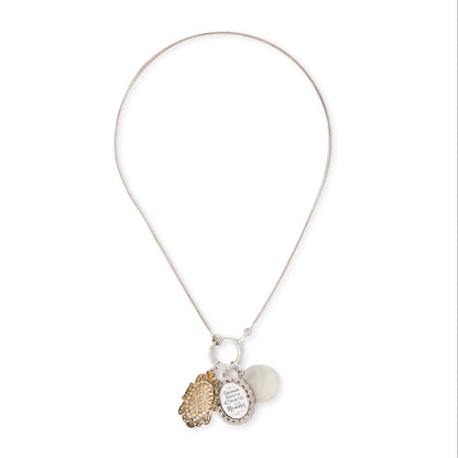 Vintage silver chain with three stunning antique religious silver pendants hanging from a large silver bolt ring clasp, one porcelain, one enamelled in a marcasite setting and one hand-painted, in an elaborate silver setting.