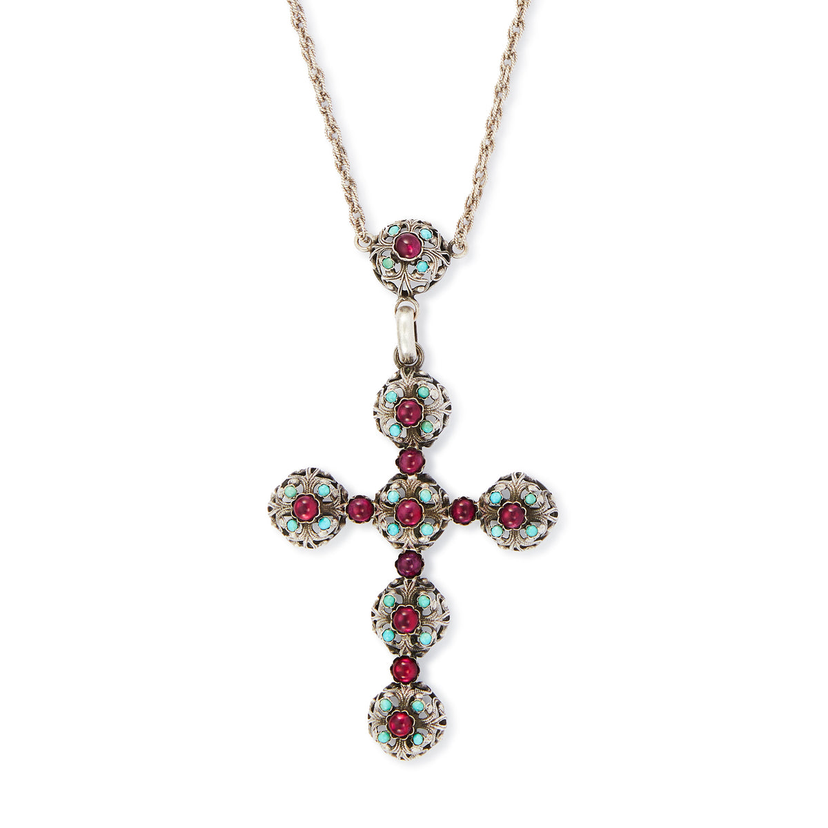 Spectacular large Edwardian cross pendant set with sixteen cabochon turquoise stones and eleven vibrant purple glass stones, on a silver rope chain.
