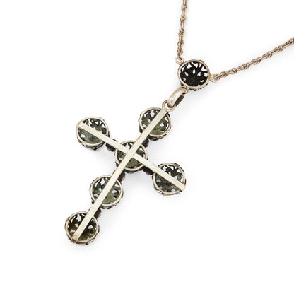Spectacular large Edwardian cross pendant set with sixteen cabochon turquoise stones and eleven vibrant purple glass stones, on a silver rope chain.