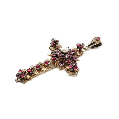 Magnificent silver gilt Austro-Hungarian cross pendant set with cabochon and faceted bohemian garnets as well as a centre pearl, and three seed pearls. Circa 1900