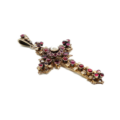 Magnificent silver gilt Austro-Hungarian cross pendant set with cabochon and faceted bohemian garnets as well as a centre pearl, and three seed pearls. Circa 1900