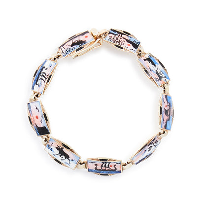 Beautifully detailed enamel disc bracelet depicting nine different nature scenes. Safety clasp attached. Scandinavian