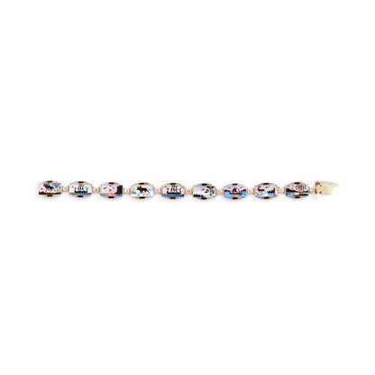 Beautifully detailed enamel disc bracelet depicting nine different nature scenes. Safety clasp attached. Scandinavian