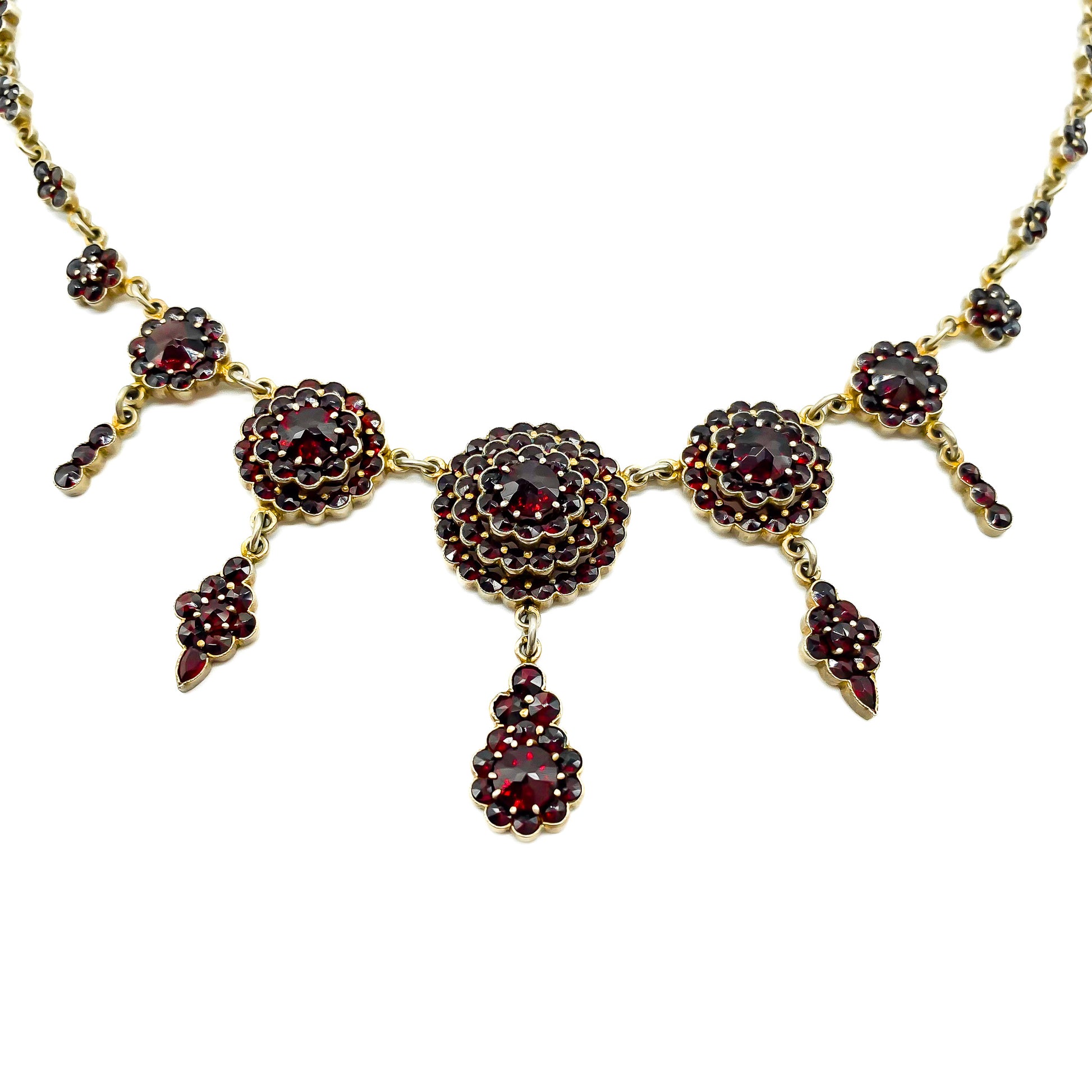 Lovely silver gilt festoon garnet necklace with five dangling drops. Circa 1930’s