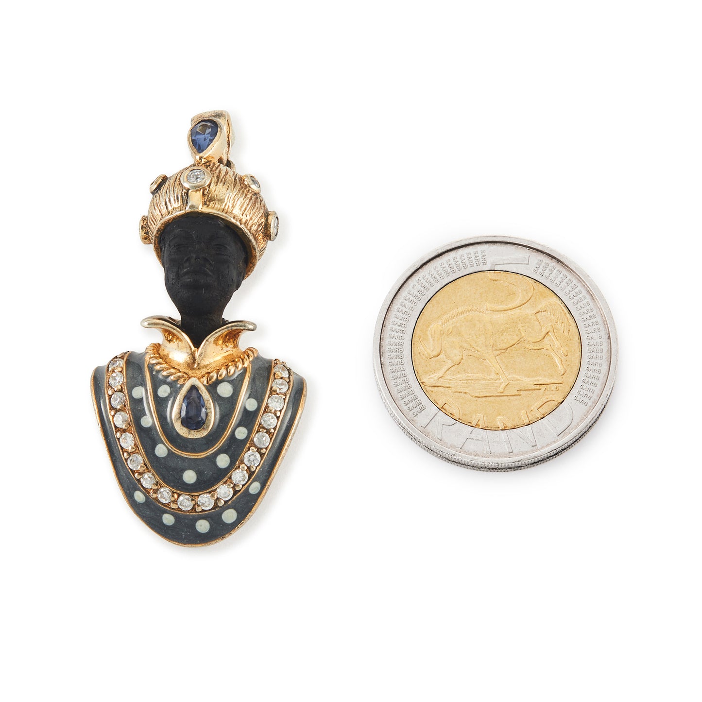 Very ornamental silver gilt figure pendant with resin face, beautiful blue enamelling, set with two sapphires and white spinels.