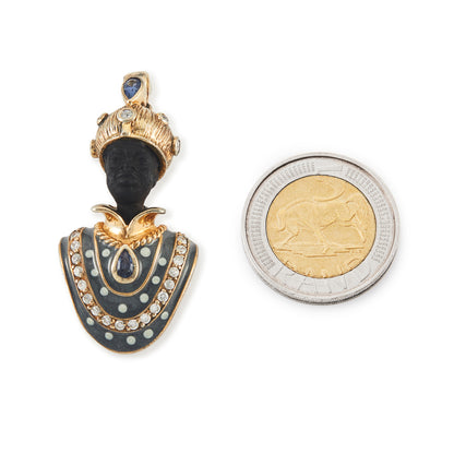 Very ornamental silver gilt figure pendant with resin face, beautiful blue enamelling, set with two sapphires and white spinels.