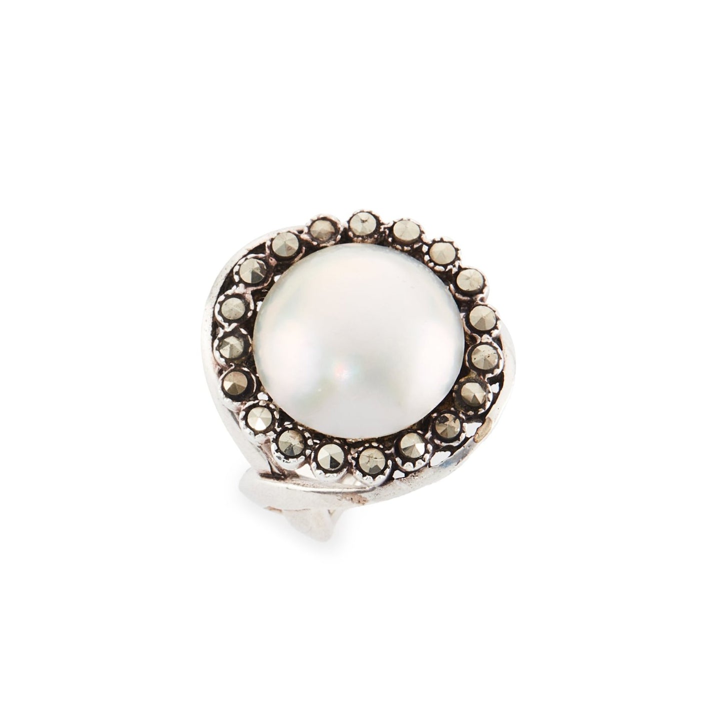 Glamorous vintage sterling silver ring set with a mabé pearl surrounded by nineteen marcasites.