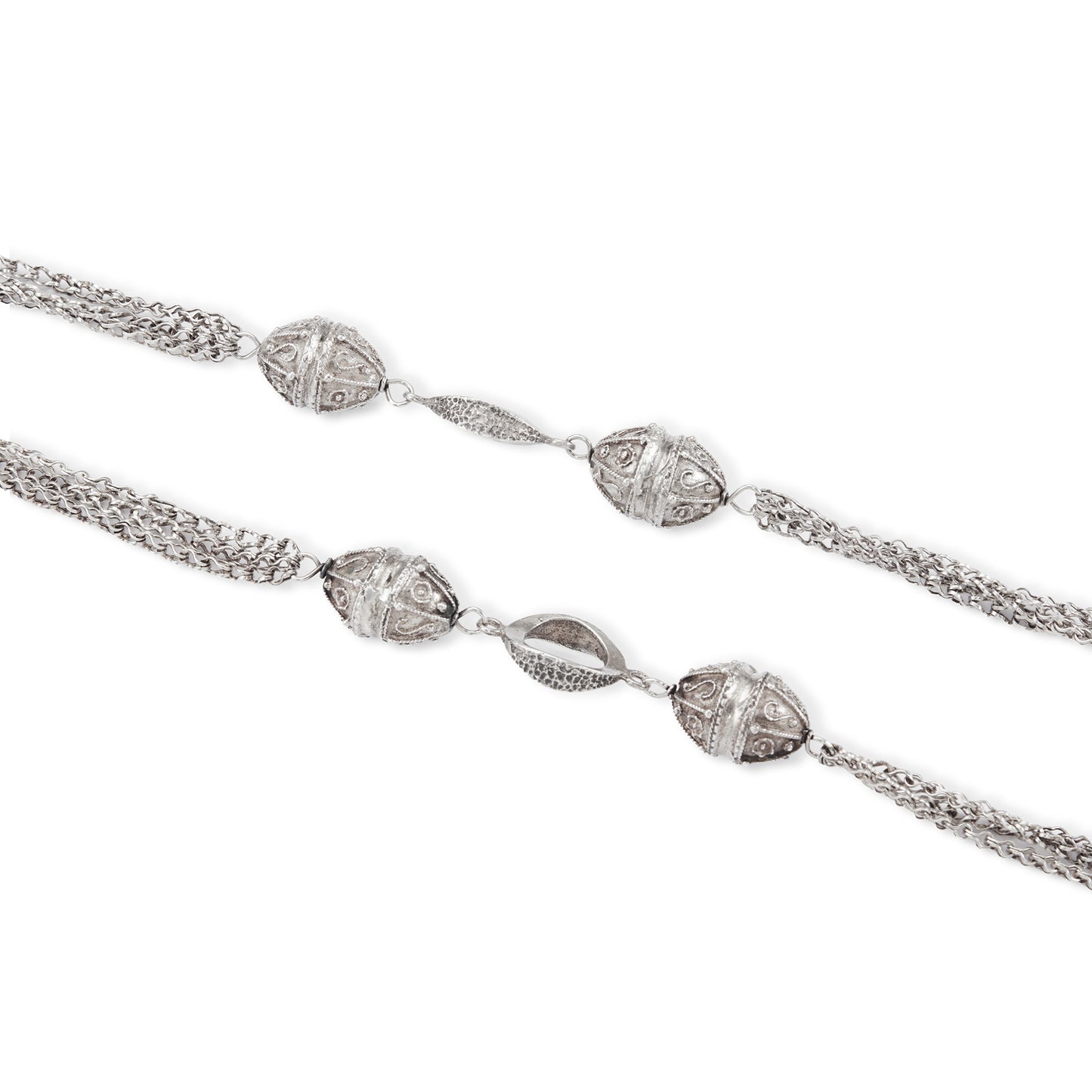Long silver Mid-century necklace with ornate silver bobbles, connectors and multiple chains.