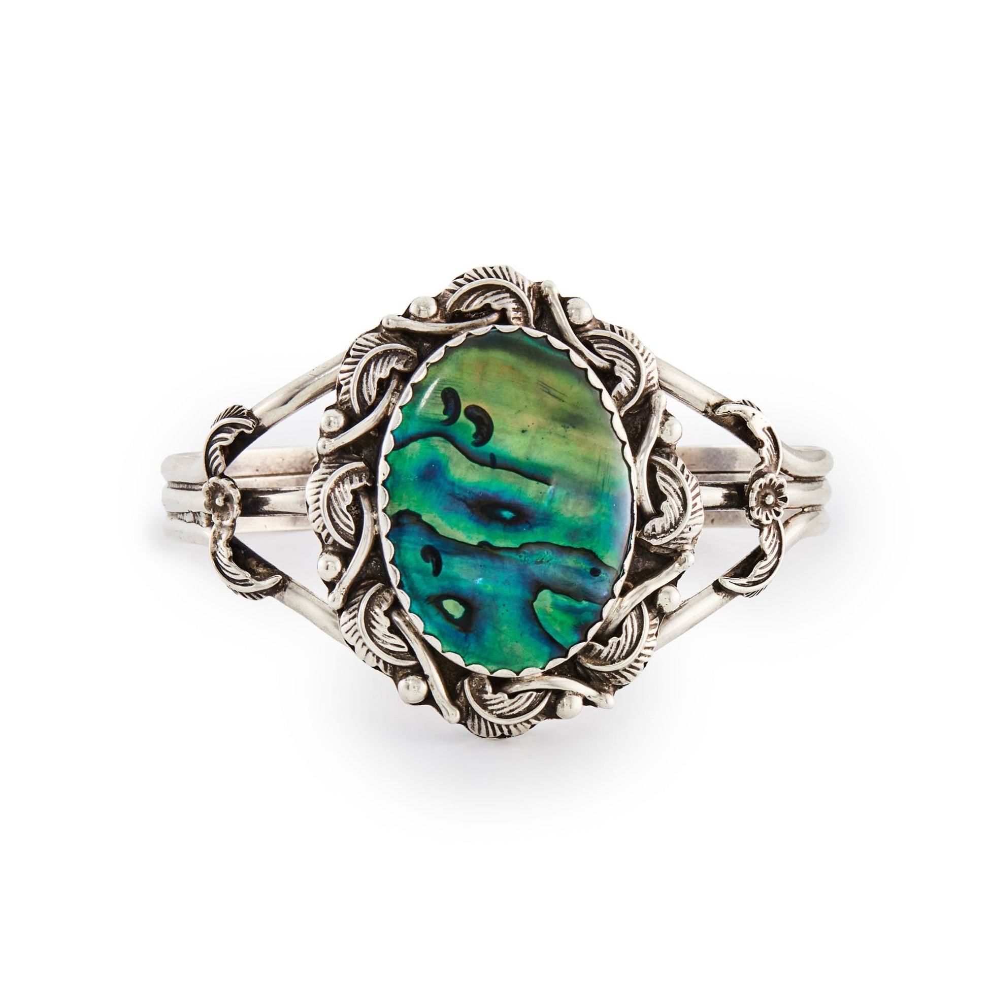 Stunning silver Native American bangle set with a lustrous oval abalone disk in deep green and turquoise hues.