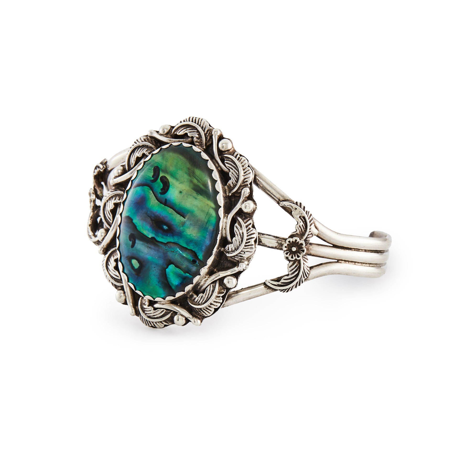 Stunning silver Native American bangle set with a lustrous oval abalone disk in deep green and turquoise hues.