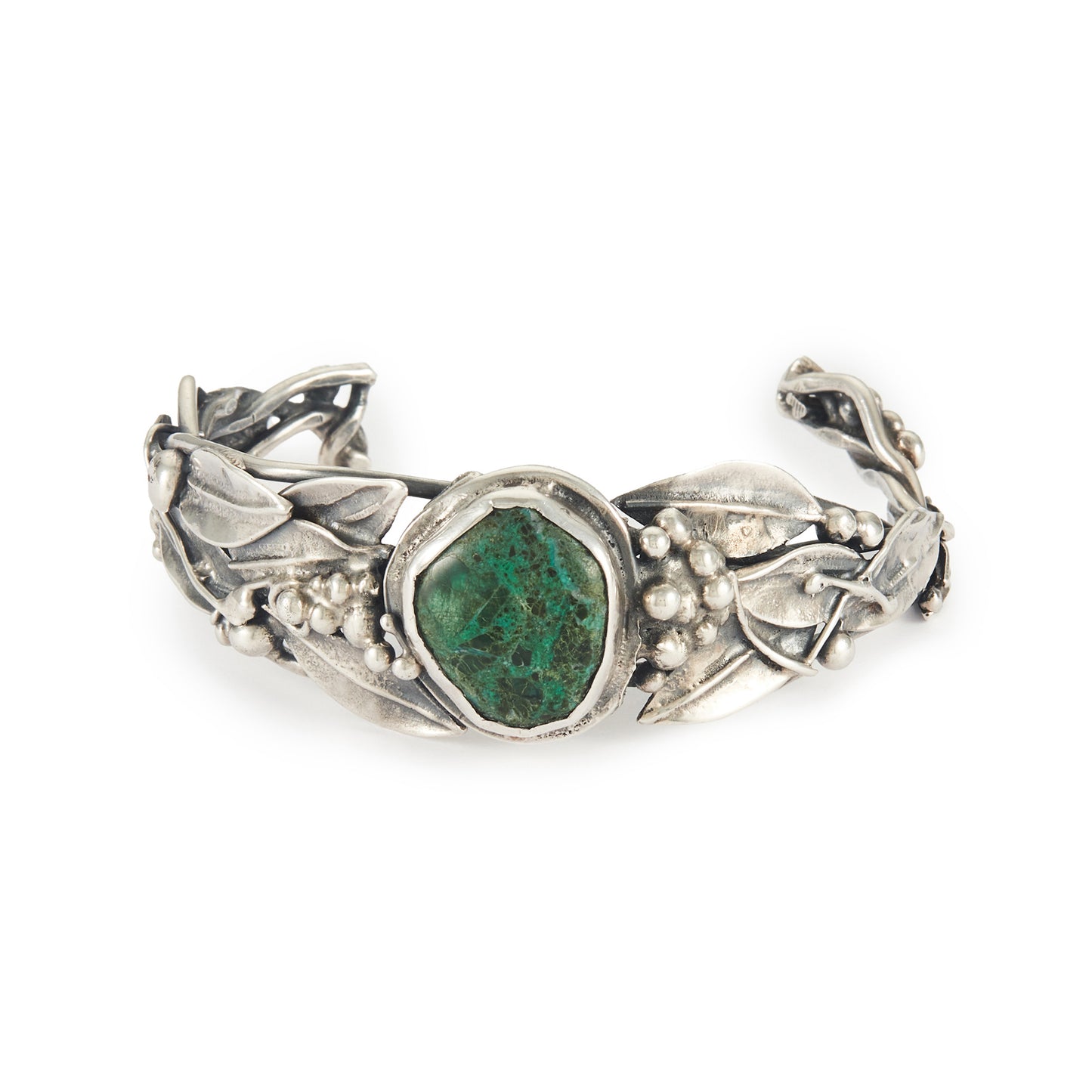 Stunning oxidised silver handmade bangle set with a dark green cabochon turquoise stone, surrounded by a leaf design. Ideal for a smaller wrist.