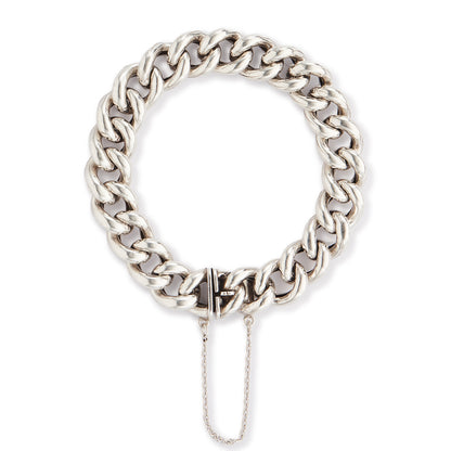 Chunky silver Victorian curb link bracelet. Safety chain attached.