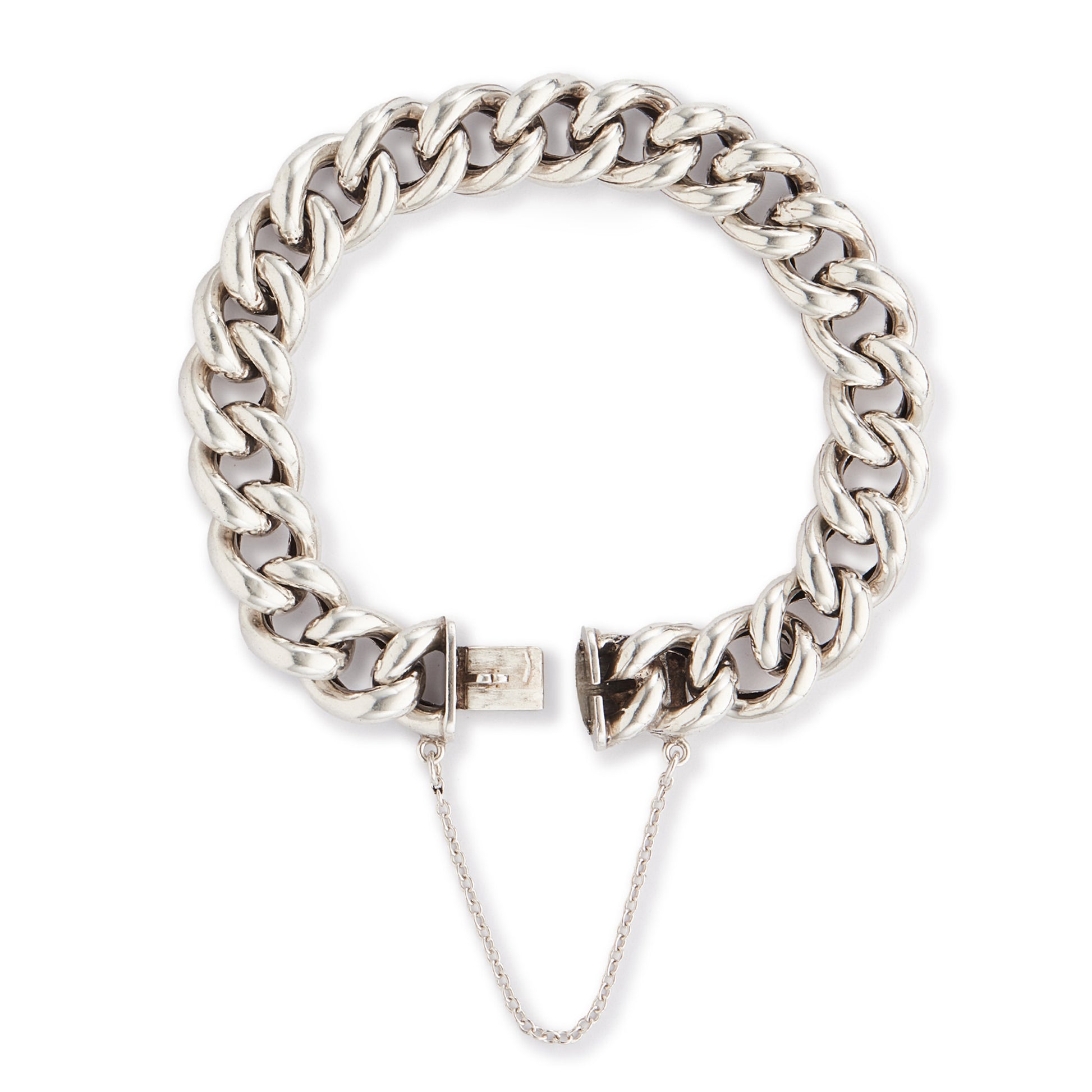 Chunky silver Victorian curb link bracelet. Safety chain attached.