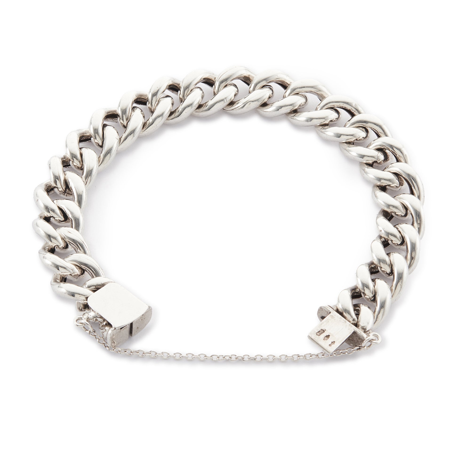 Chunky silver Victorian curb link bracelet. Safety chain attached.