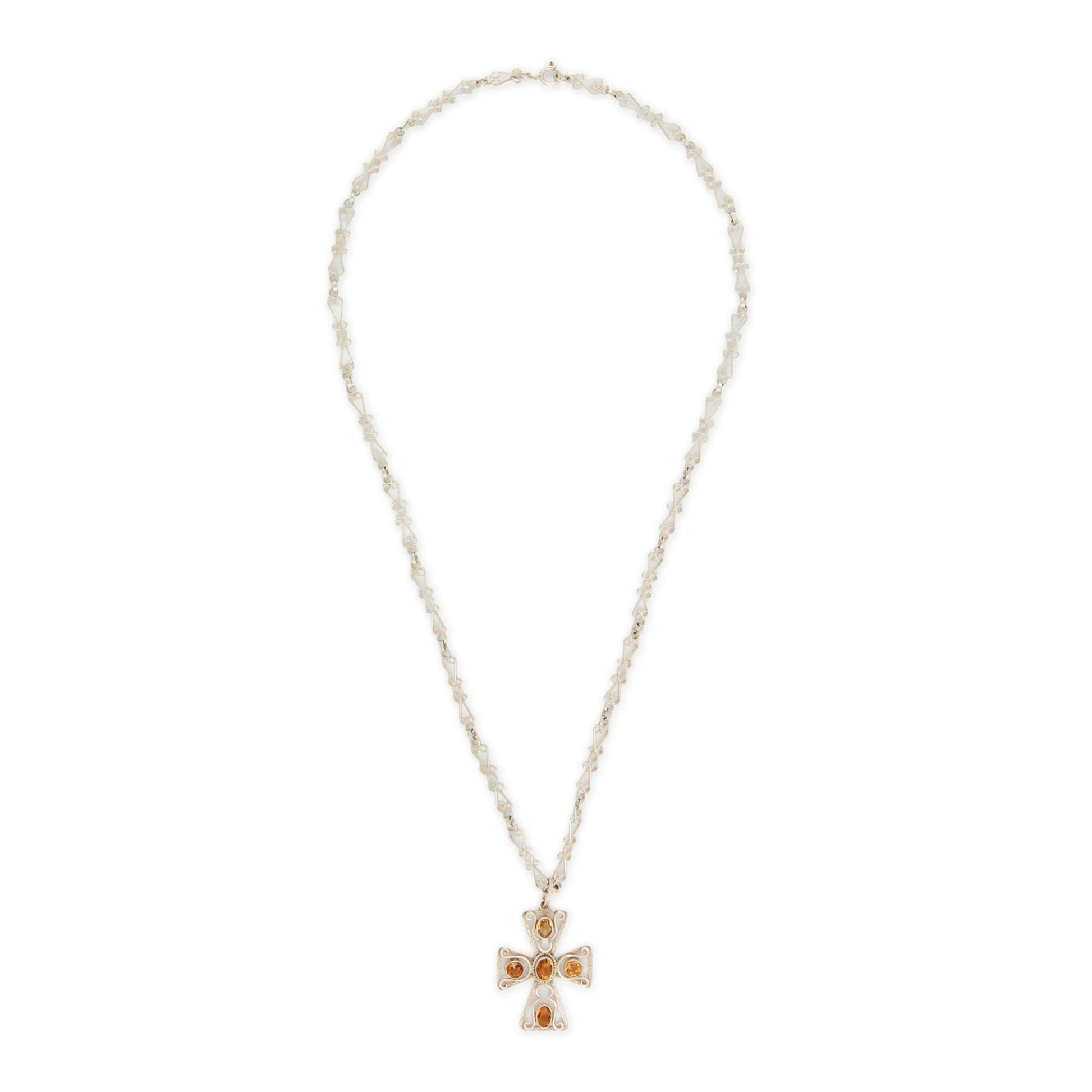 Lovely cross pendant set with five faceted citrines on an intricate fancy link silver chain. Circa: 1930’s