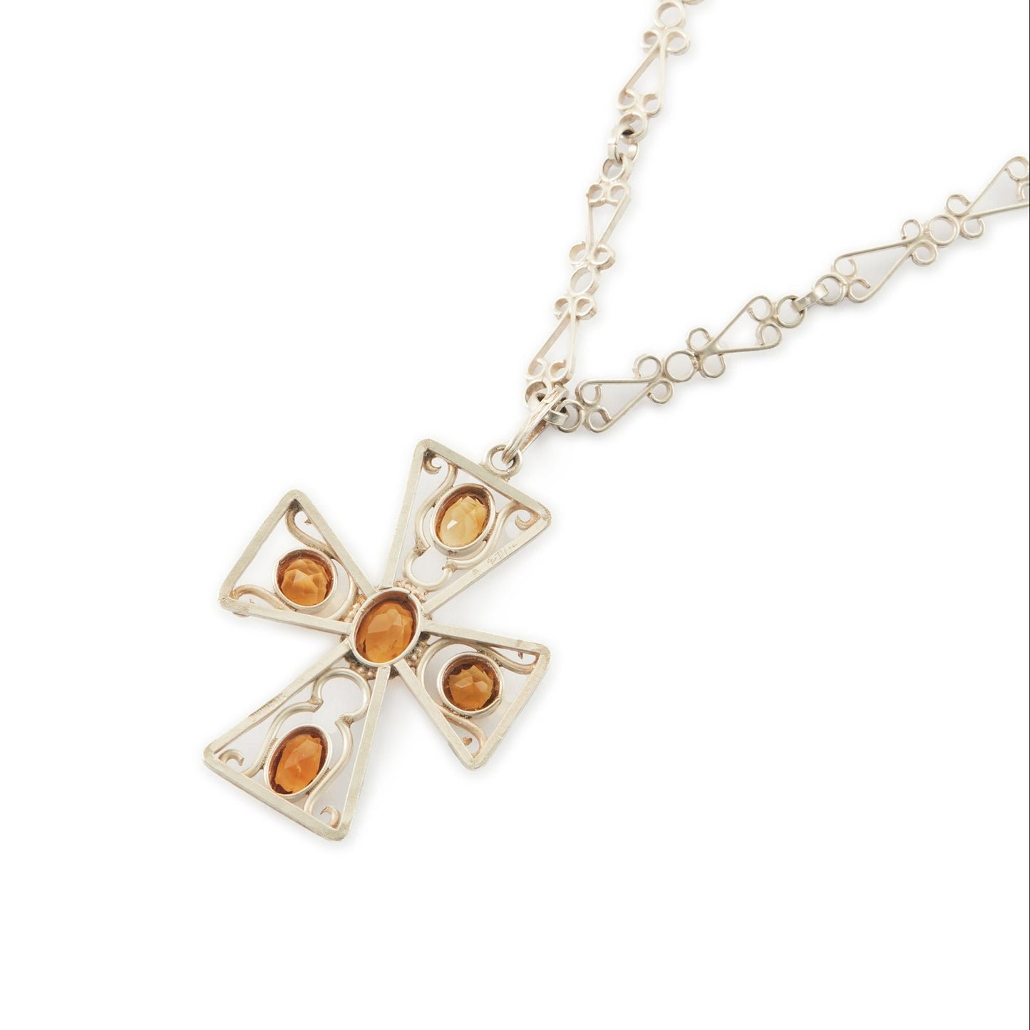 Lovely cross pendant set with five faceted citrines on an intricate fancy link  silver chain. Circa: 1930’s