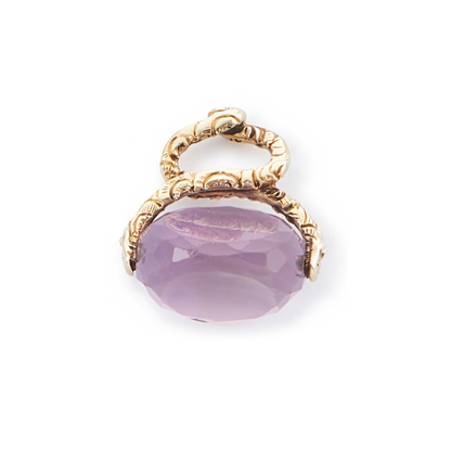 Lovely small 9ct yellow gold vintage swivel fob consisting of a beautifully faceted amethyst stone suspended from intertwined snakes.