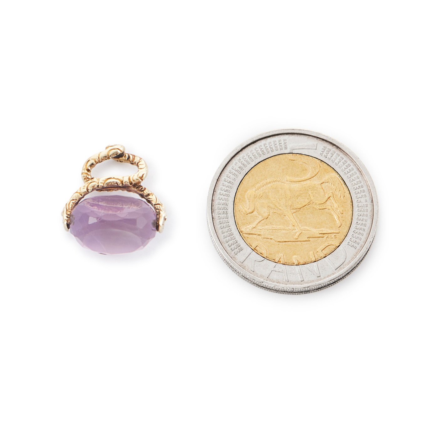 Lovely small 9ct yellow gold vintage swivel fob consisting of a beautifully faceted amethyst stone suspended from intertwined snakes.