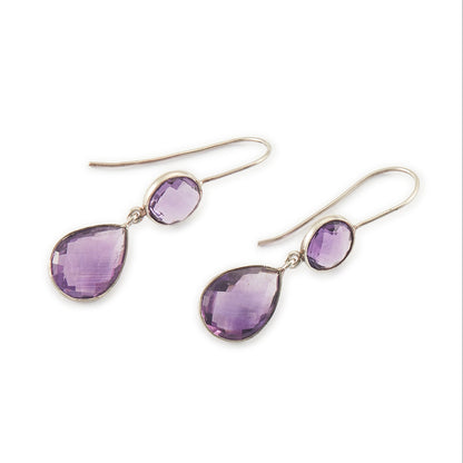 Lovely sterling silver pendant earrings, each set with a beautifully faceted round and teardrop amethyst.