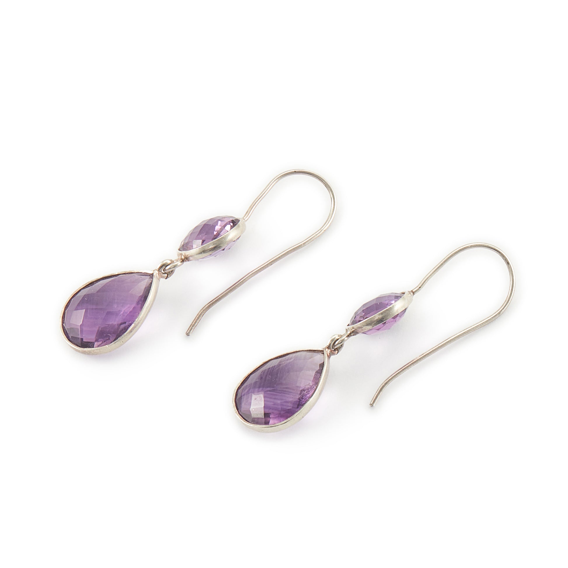 Lovely sterling silver pendant earrings, each set with a beautifully faceted round and teardrop amethyst.