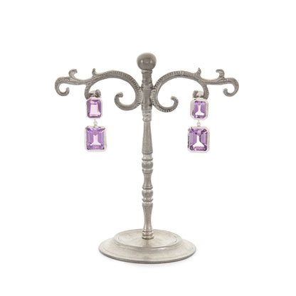 Stylish sterling silver drop earrings set with beautifully faceted amethysts.