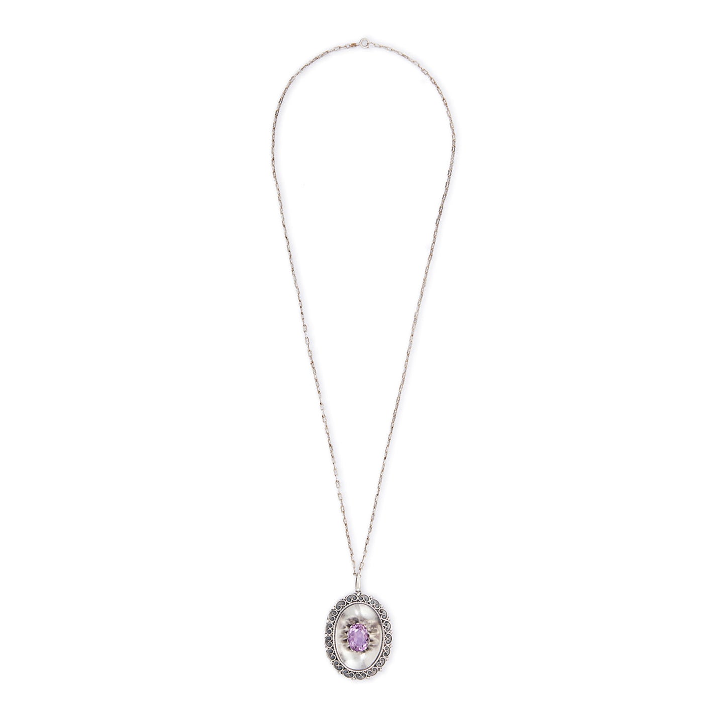 Magnificent Scottish sterling silver pendant centred with a large oval amethyst in a claw setting, with scroll work on the edges. The pendant hangs from an 82.1cm sterling silver fancy link chain.