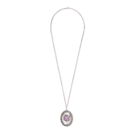 Magnificent Scottish sterling silver pendant centred with a large oval amethyst in a claw setting, with scroll work on the edges. The pendant hangs from an 82.1cm sterling silver fancy link chain.