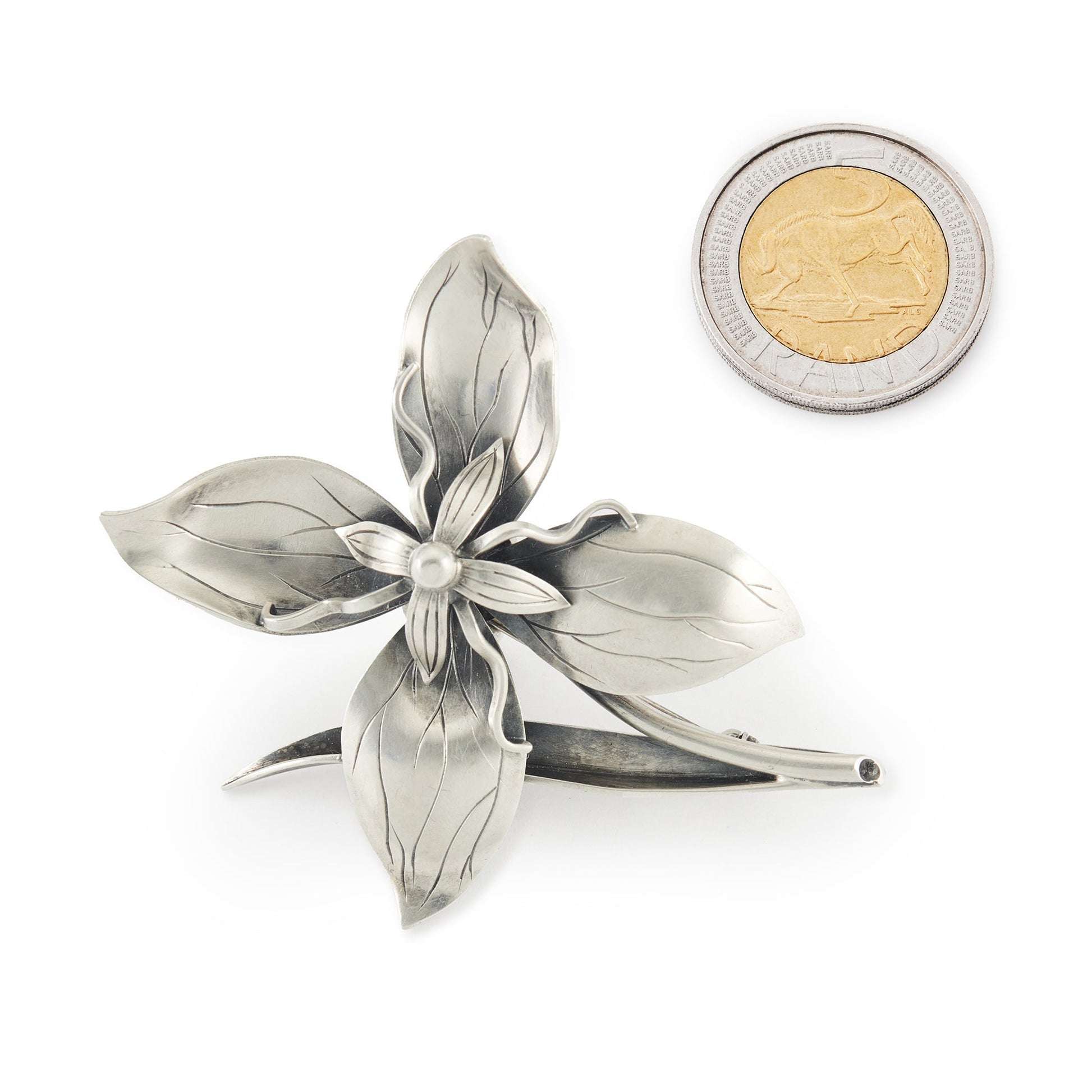 Sterling silver Danish designer three-dimensional flower brooch. Fully hallmarked.
Designer: Gertrud Engel
Manufacturer: Anton Michelson
